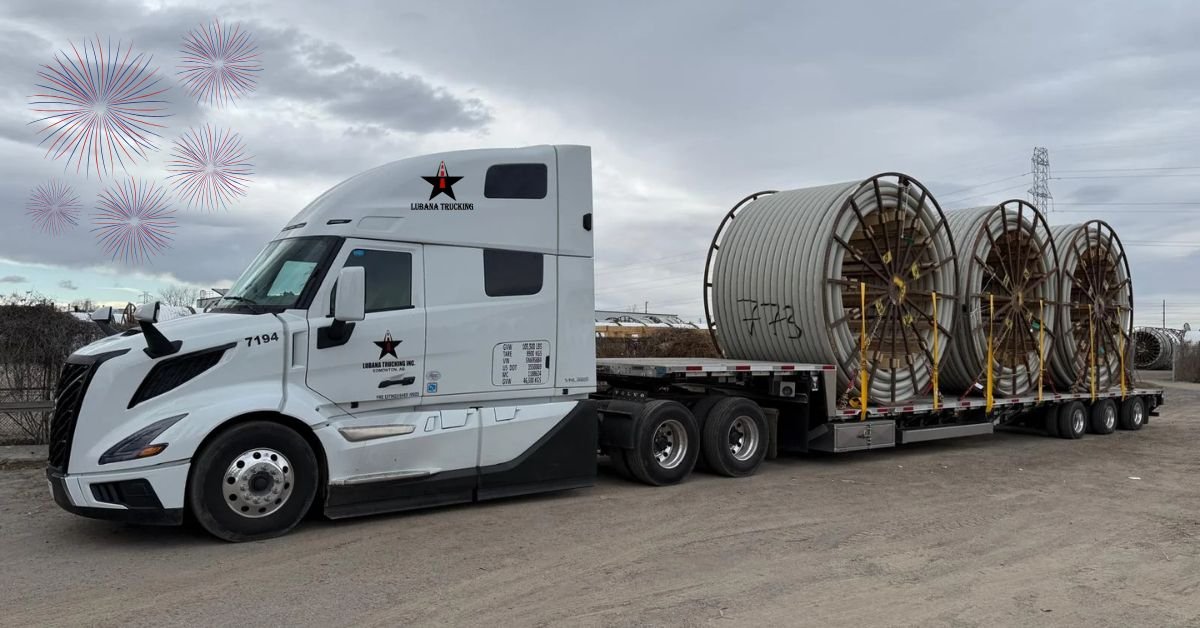 Semi-truck driving through snowy Edmonton roads at sunrise for New Year 2026 logistics.