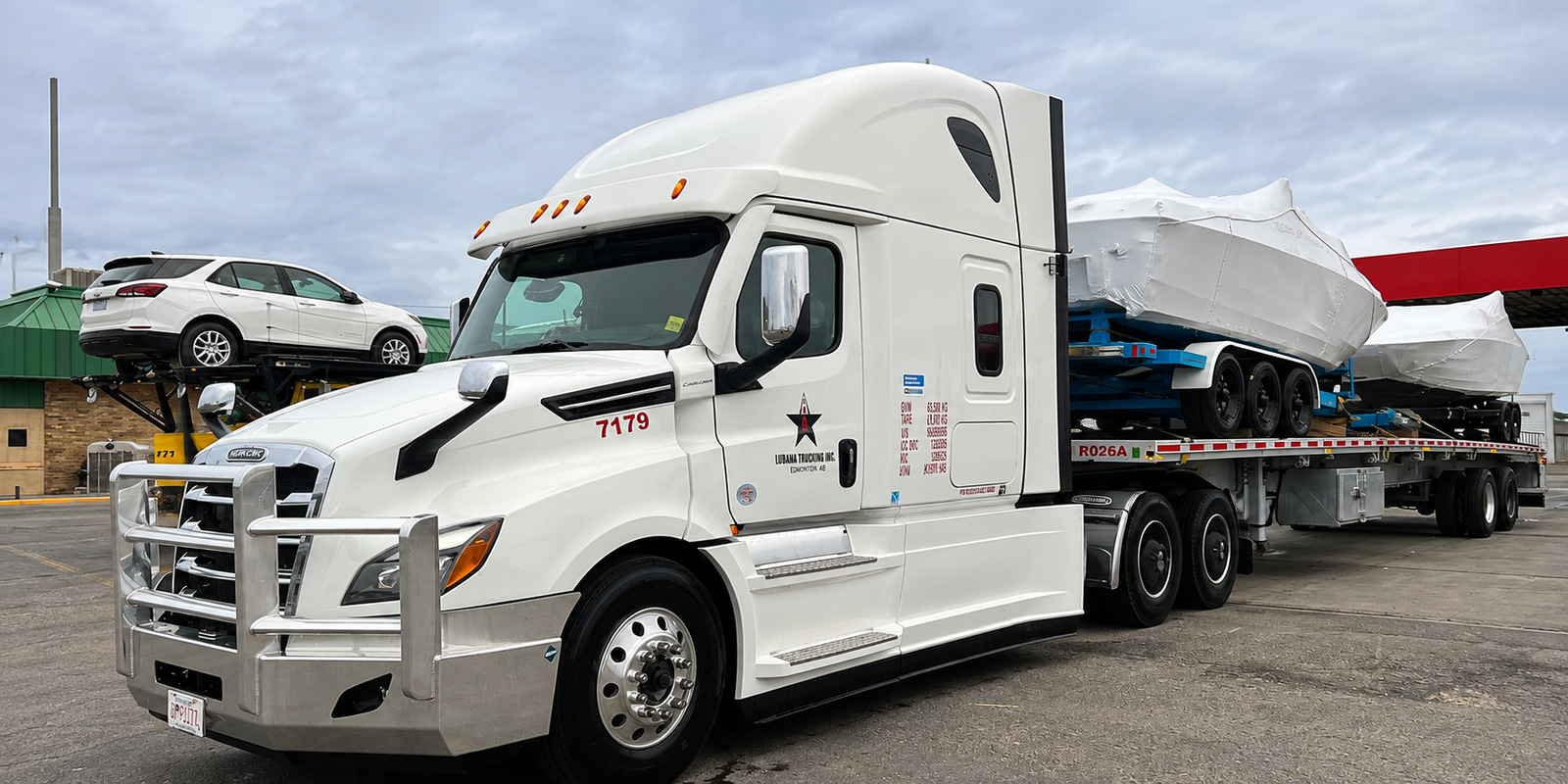 Lubana Trucking oversized boat transportation service with specialized heavy haul equipment across Canada and the USA.